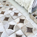 ALPHA – Custom Animal Hide Rug in Geometric Circle Pattern 1
