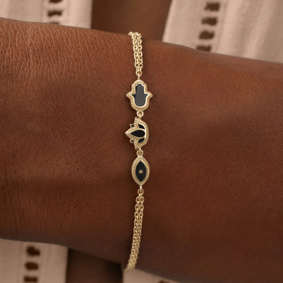 Sacred Poise Multi-Charm Onyx Bracelet