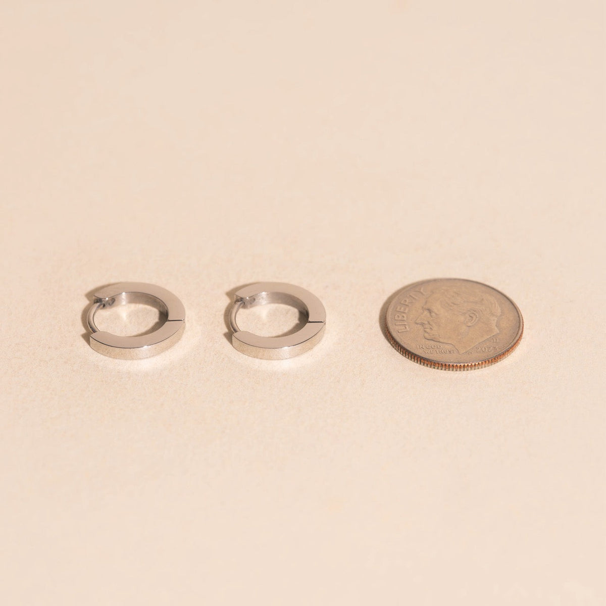 O.G. Smooth Huggie Hoop Earrings