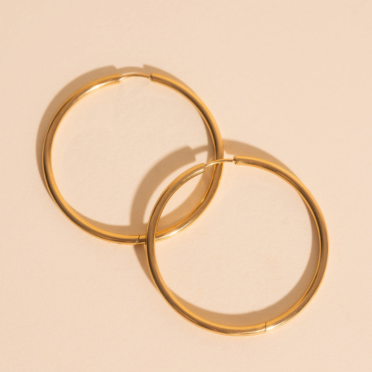 Titanium Circle Rounded Huggie Hoop Earrings - FeatherTUFF™