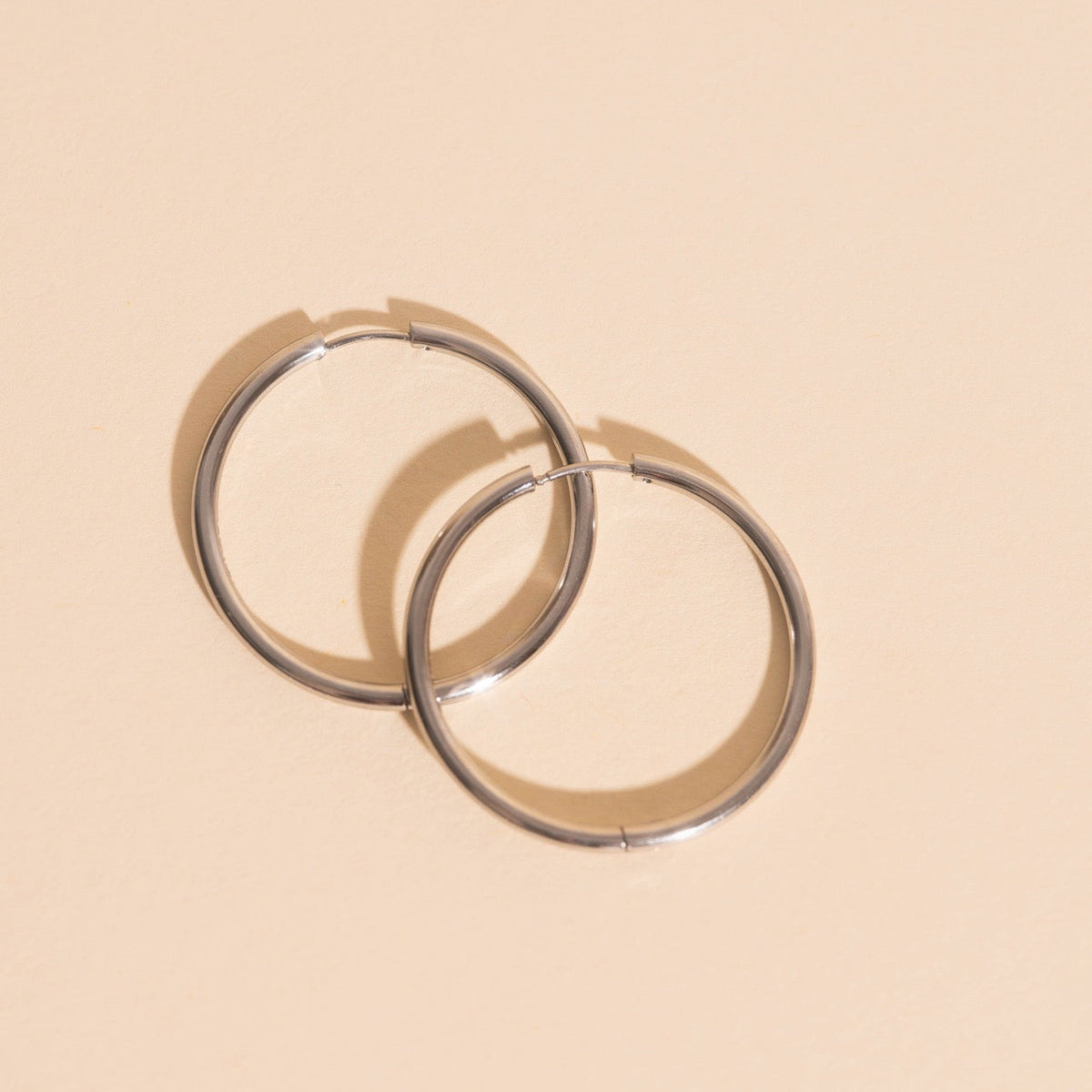 Titanium Circle Rounded Huggie Hoop Earrings - FeatherTUFF™