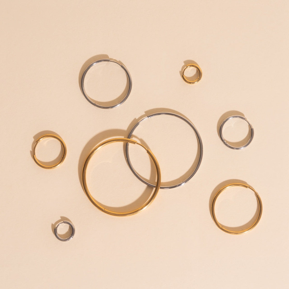 Titanium Circle Rounded Huggie Hoop Earrings - FeatherTUFF™