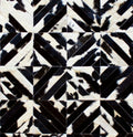 SQUARES – Black and White Patagonian Cowhide Rug 1