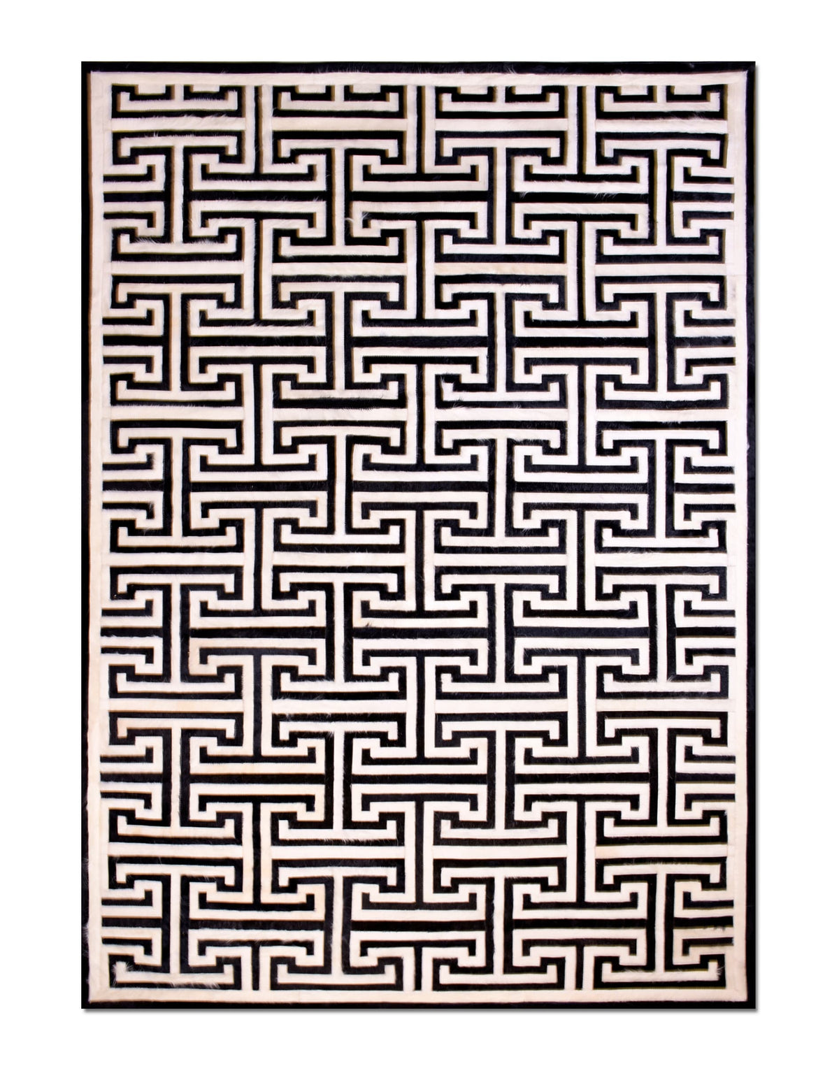 T Model – Maze-Inspired Cowhide Patch Rug