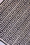 T MODEL – Maze-Inspired Cowhide Patch Rug 1