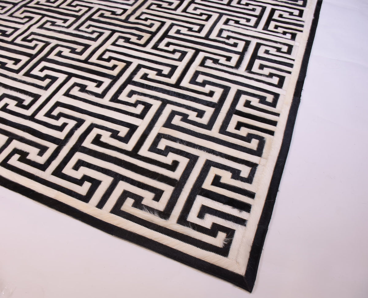 T Model – Maze-Inspired Cowhide Patch Rug