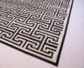 T MODEL – Maze-Inspired Cowhide Patch Rug 6