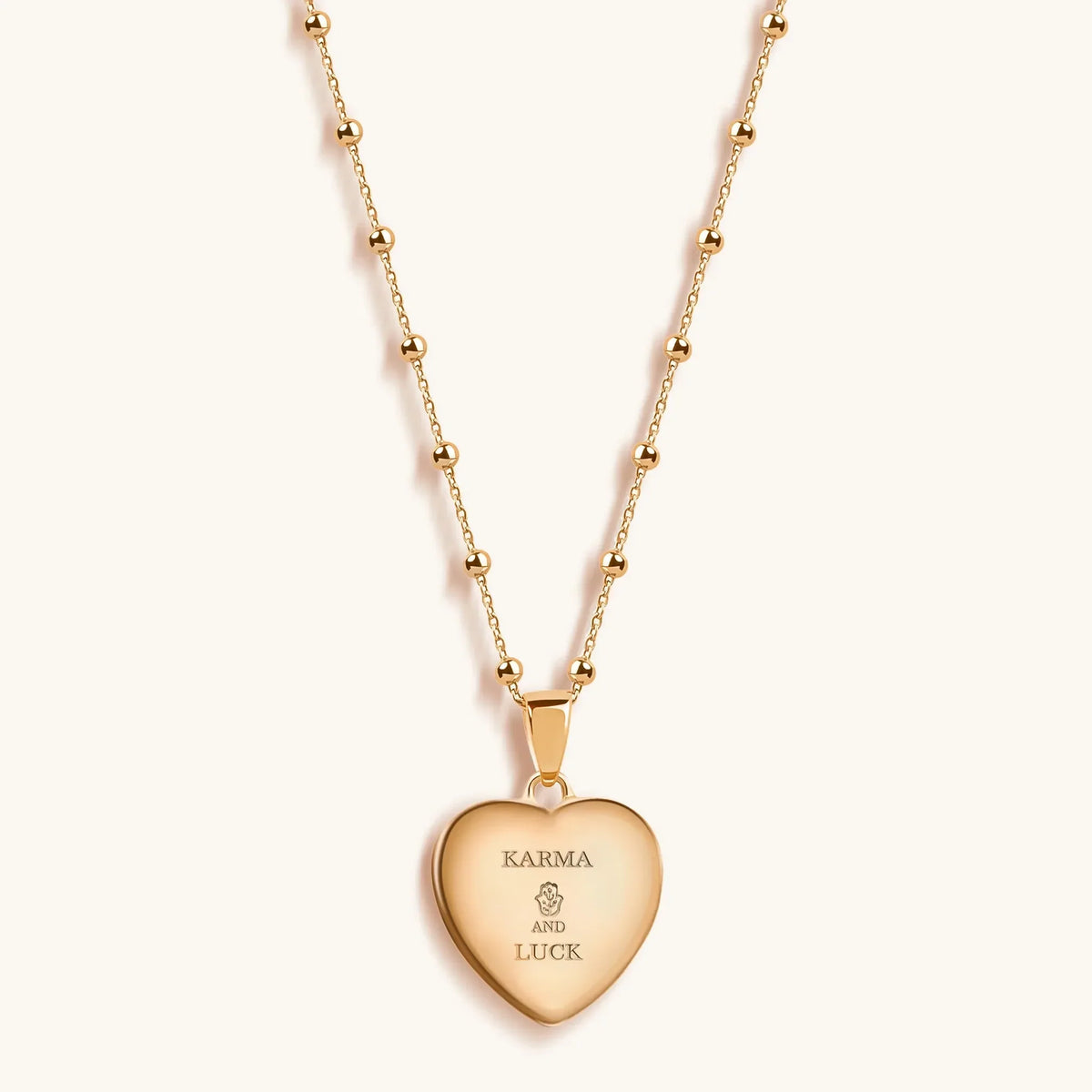 Harmonious Emotions Mother Of Pearl Heart Evil Eye Necklace