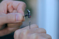 Jujutsu Kaisen™ Nobara's Hammer & Nail Pendant 3