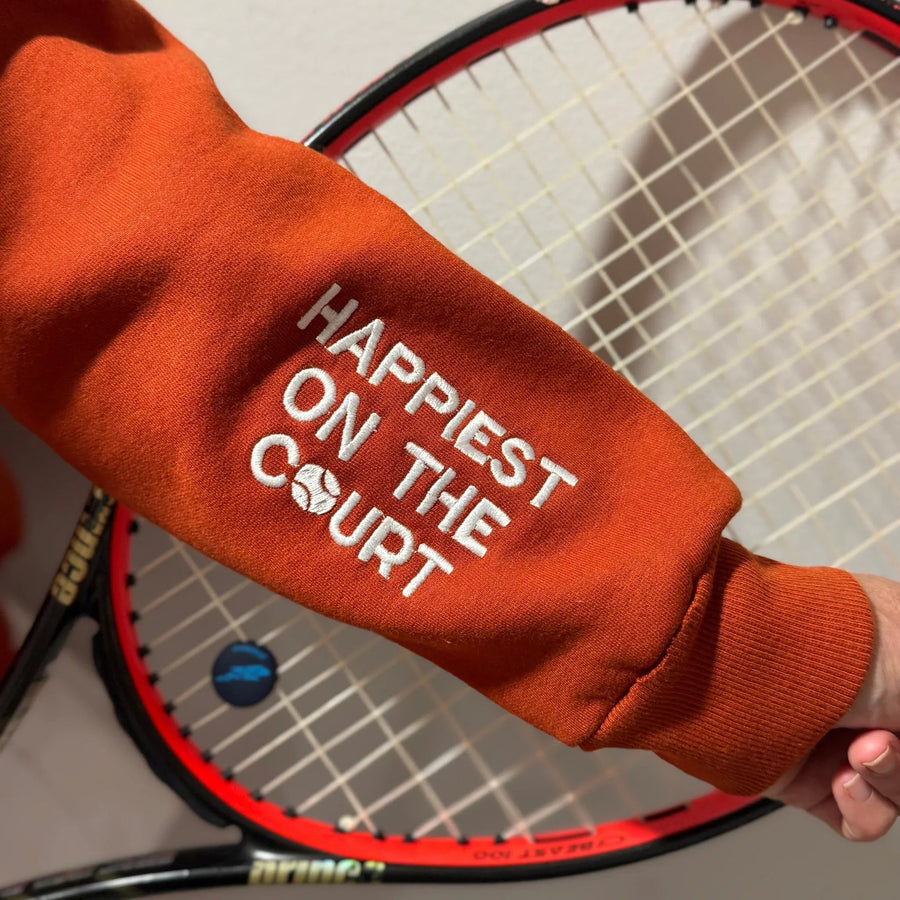Happiest on the Court® 1/4 zip tennis sweatshirt in Burnt Orange