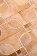 EYES – Geometric Cowhide Rug with Curved Motif 1