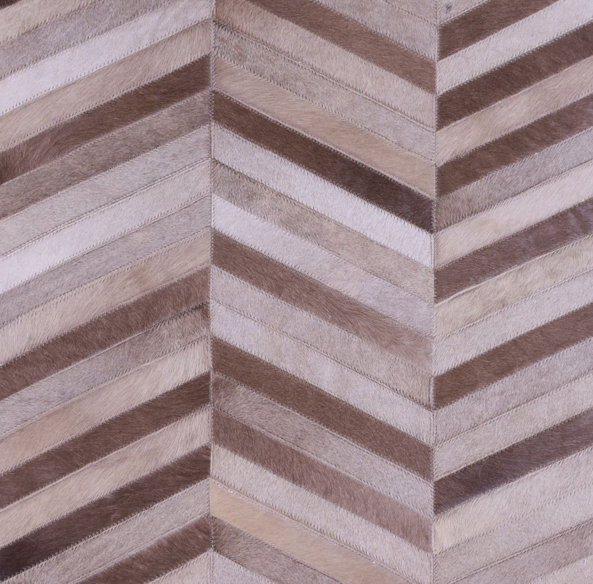 HERRINGBONE LONG – Large Patchwork Cowhide Rug