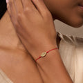 Spirit’s Innovation Evil Eye Peridot Red String Bracelet 1